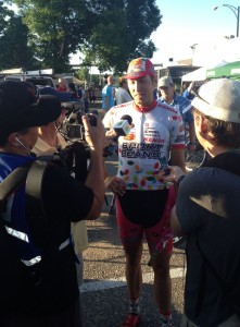 Sean Mazich talks to reporters following his win at Cannon Falls.