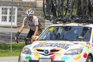 Ian Burnett gets some reinforcement from the team car.